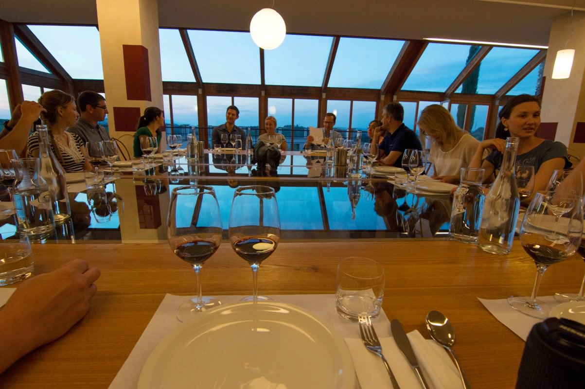 Friends enjoying wine tasting in Tuscany