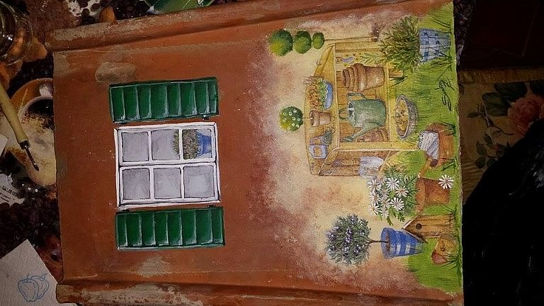 Decoupage decoration on old Tuscan tiles