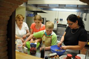 Crushing cookies for chocolate salami