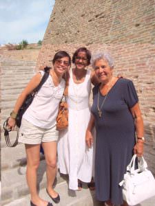 A granny from Lari poses with our guests
