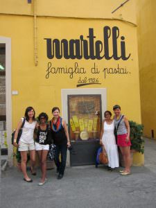 Girls visiting the pasta factory in Lari