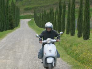 Renting a vespa scooter during a honeymoon in Tuscany