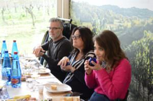 Smelling the typical olive oil from Tuscany