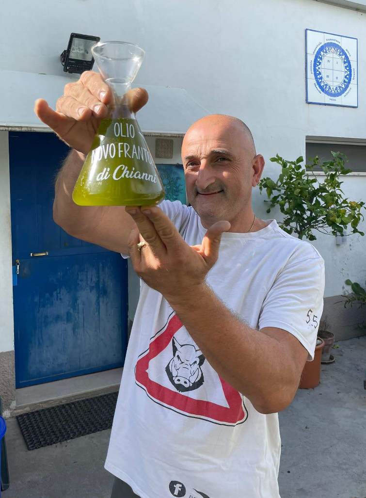 Guido showing his new extra virgin olive oil
