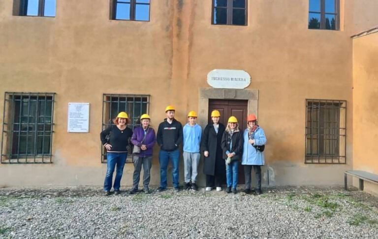 Moira leading our guest to the mining cave