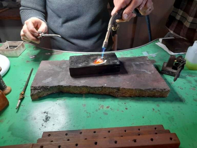 Our teacher Sandra showing how to melt the silver