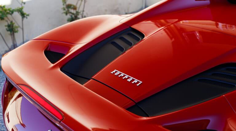 Driving through the Pisan hills with Ferrari car