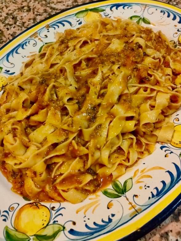 Typical hand made pasta with a meat-based sauce
