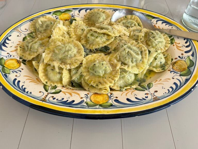Hand-made ravioli with butter and sage sauce