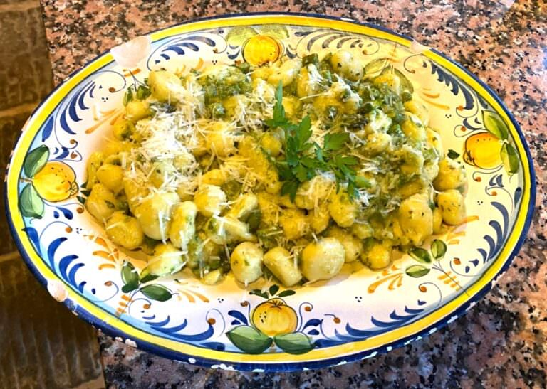 Typical potato gnocchi with asparagus sauce