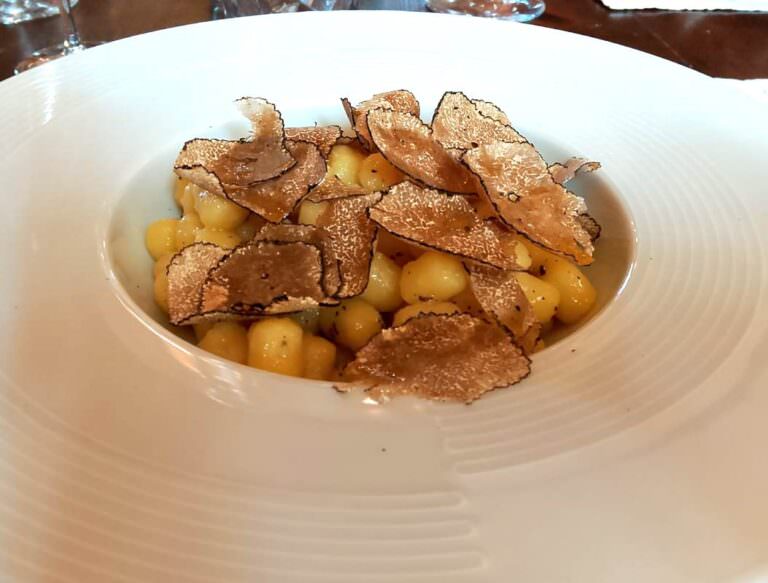 Primo piatto based on potato gnocchi