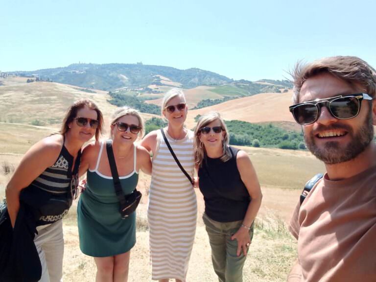 Our guide Luca leading a grouo of friends for a cheese and wine tour